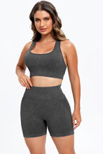 Close-up of washed texture fabric and square‑neck stitching in dark gray LineaFlow set.