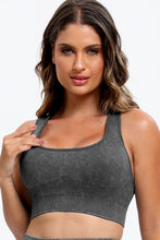 Close-up detail of square-neck crop top in dark gray LineaFlow Vitality set.