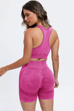 Back view of deep rose LineaFlow Vitality set showing bra straps and smooth pants fit.