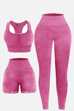 Flat lay of deep rose LineaFlow Vitality set: square-neck top, bra, and high-waist pants.