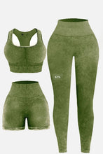 Flat lay of Moss LineaFlow Vitality set: square-neck top, bra, and high-waist pants.
