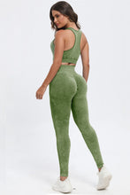 Rear view of woman lounging in Moss LineaFlow Vitality set.