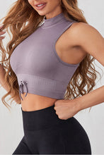 Left side view of moonlit mauve Lunessa Sport Tank showing sleek mock neck.