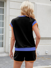 Back view of Lustressa™ Contrast Knit Shorts Set with bold trim in black.