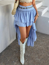 Close-up side front angle of Lyvérielle Cascade Skirt light blue highlighting ruched waist and micro-mini layered front