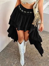Model walking forward in Lyvérielle Cascade Skirt black, showing layered high-low flowy motion
