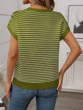 Back view of Matcha Green striped knit top showing smooth fit and clean stripe alignment, worn with black trousers.
