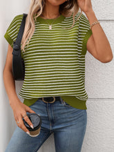 Model wearing Striped Round Neck Knit Top in matcha green, paired with denim jeans for a chic casual daytime look.
