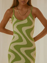 Zoomed-in model image showing neckline and textured knit of Matcha Green Luxnometry Maxi Sweater Dress.