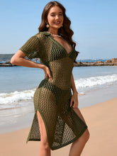 Model wearing matcha green slit openwork Johnny collar short sleeve cover-up dress at beachside, featuring side slit and breezy fit