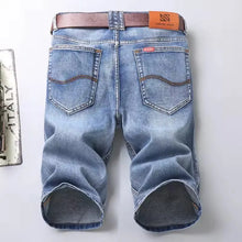Men's Medium Blue vintage wash stretch denim bermuda shorts back view.