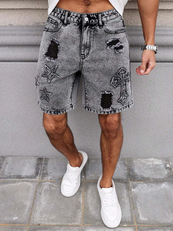 Men's embroidered distressed dark gray denim shorts front view on model.