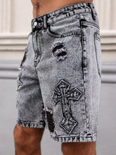Left side view of men's embroidered distressed dark gray denim shorts.