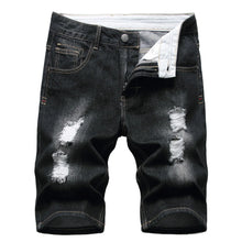 Front view of men's black slim fit light washed distressed denim shorts.