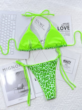 Mint green leopard print halter neck tie side bikini set back flat lay view