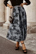 Misty blue Elverra Bloomline Maxi Skirt styled with black top and heels