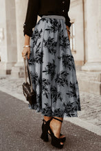 Side view of Misty blue Elverra Bloomline Maxi Skirt showcasing botanical embroidery