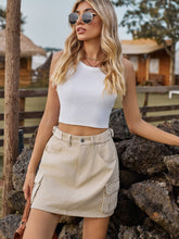mocha adjustable waist denim skirt styled white top sunglasses