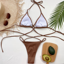 Back flat lay of mocha halter neck crisscross ribbed bikini set showing ribbed texture and high-cut bottom design