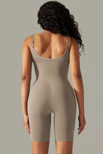 Mocha active romper back view showing thick spaghetti straps and contoured fit.