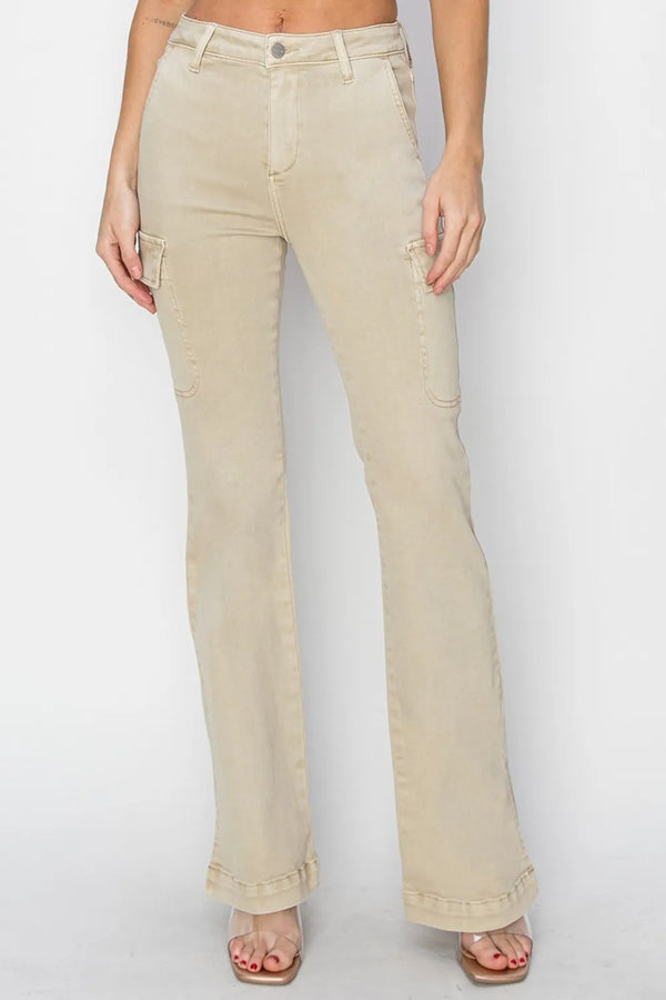 Model wearing RISEN Full Size High Rise Side Slit Cargo Bootcut Jeans front view in stone.