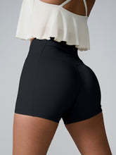 Momentum FlexTone Pocket Shorts back view in black with mid-back pocket.