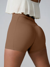 Momentum FlexTone Pocket Shorts back view in chestnut with mid-back pocket.
