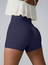 Momentum FlexTone Pocket Shorts back view in navy with mid-back pocket.