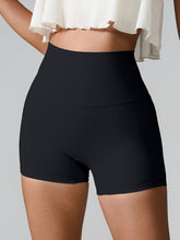 Momentum FlexTone Pocket Shorts front view in black high-waist design.