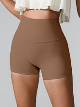 Momentum FlexTone Pocket Shorts front view in chesnut high-waist design.