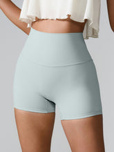 Momentum FlexTone Pocket Shorts front view in light blue high-waist design.