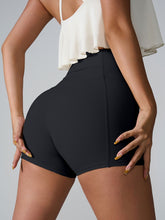 Momentum FlexTone Pocket Shorts side view in black showing sleek fit.