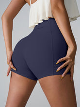 Motion twirl shot of Momentum FlexTone Pocket Shorts in navy highlighting fit.