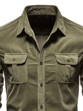 Close-up front detail of moss Ebb & Flow Solstice Button-Down Shirt showing collar, buttons, and chest pocket stitching.