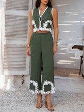 Close-up front view of Moss Xyvello contrast trim on vest and pants