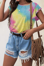 Model wearing multicolor Printed Round Neck Short Sleeve T-Shirt with flutter sleeves