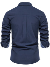 Back view of men’s navy Apex Flourish quarter-sleeve button-down shirt