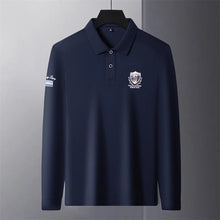 Front view of yellow Equestrian Crest Designer Polo on hanger