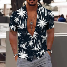 Model wearing Navy Blue Tropicscape Breeze Hawaiian Button-Up in classic palm tree print, front view