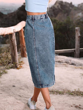 Navy Denivéra Button Skirt back view on nature trail