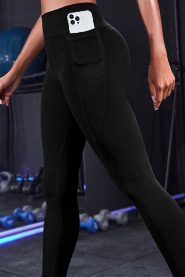 side view of nexaflex core leggings black with phone in pocket