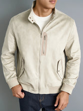 Off-White Men’s Luxe Suede Stand Collar Jacket with chest zip pocket and ribbed sleeves, front model pose.