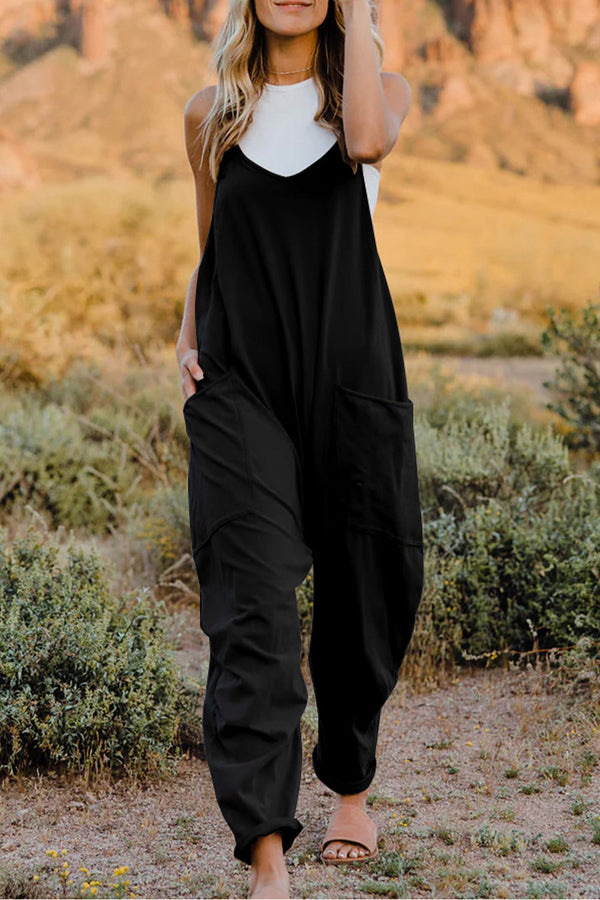 Model wearing Onvaira V-neck sleeveless jumpsuit front view in black.