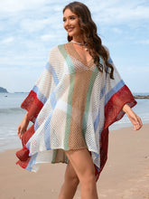Side view of khaki openwork color block plunge cover-up highlighting lightweight openwork knit and flattering silhouette