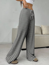 Black Orvella LumaTide Pants perfect for casual dinners, brunches, or weekend plans.