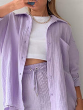 Close- up shot of lavender Own Your Lane Luxe Set highlighting collar,   button detail and drawstring elastic waist.