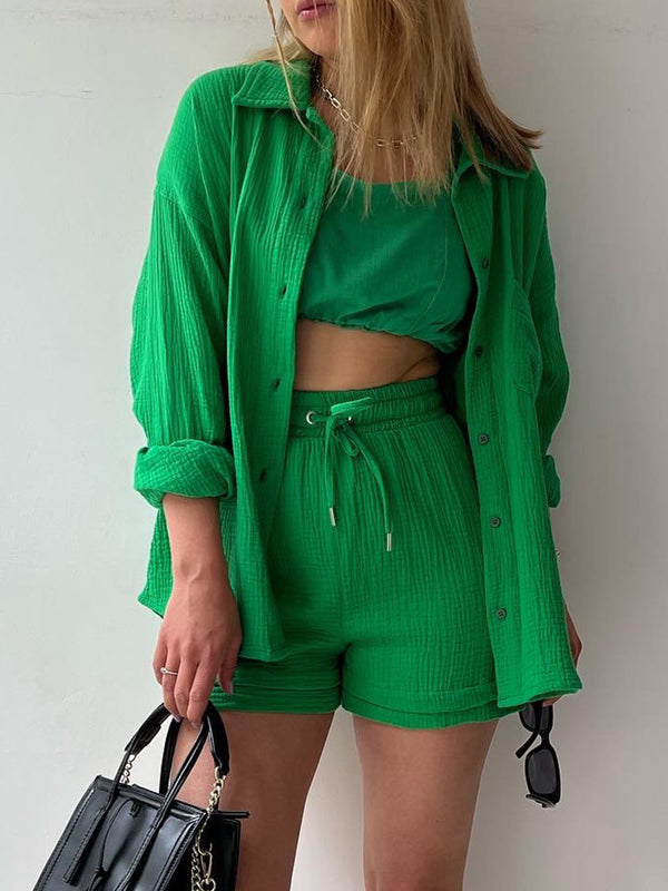 Model wearing mid green Own Your Lane Luxe Set, front view.