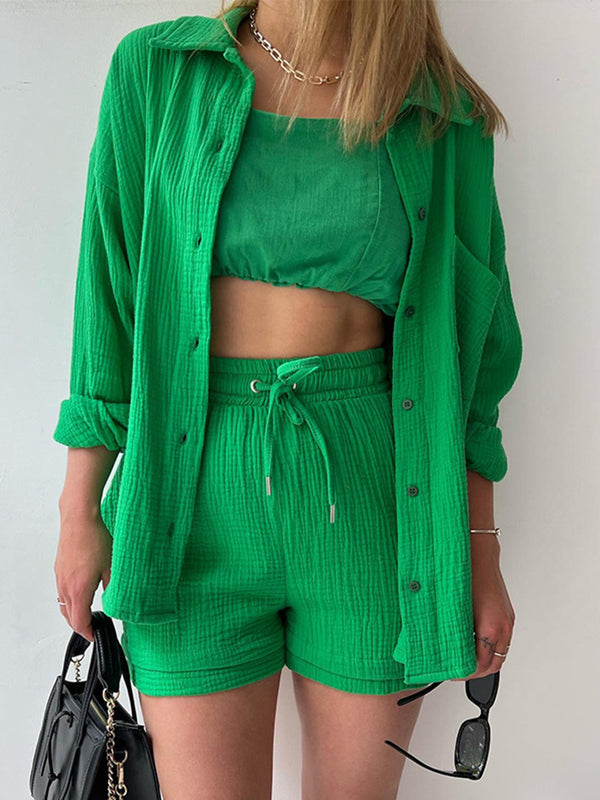Model in mid green Own Your Lane Luxe Set with white sneakers for brunch and city exploring.
