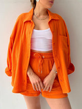 Model in orange Own Your Lane Luxe Set with espadrille wedges for rooftop lunches and sunny gatherings.