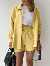 Model styled in true yellow Own Your Lane Luxe Set, front view.